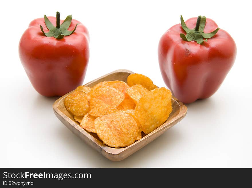 Potato chips with red paprikas