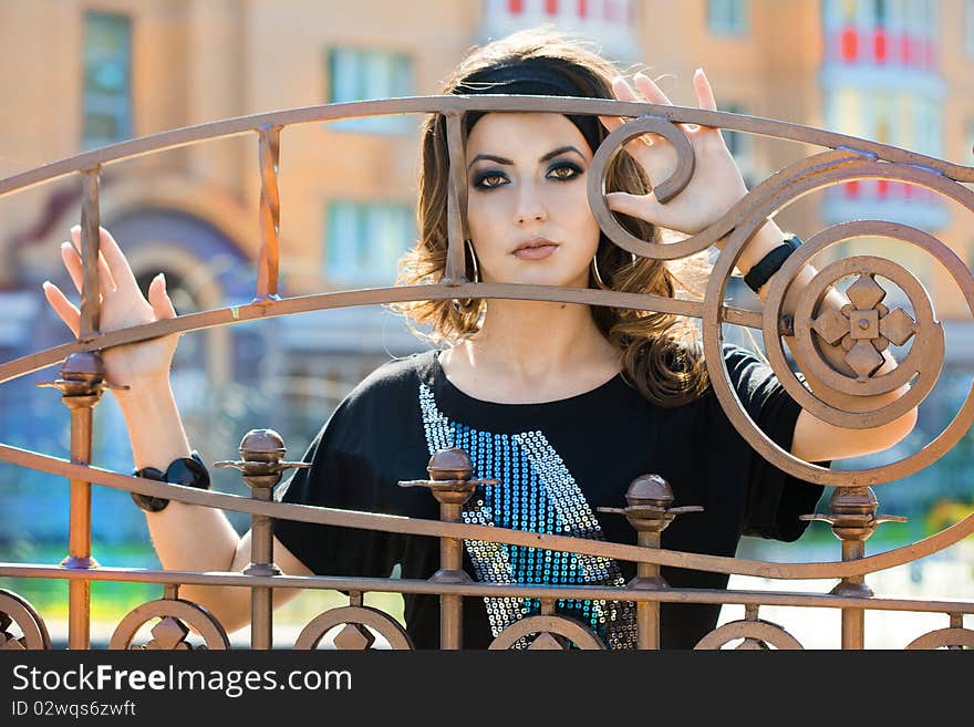 Woman near the fence