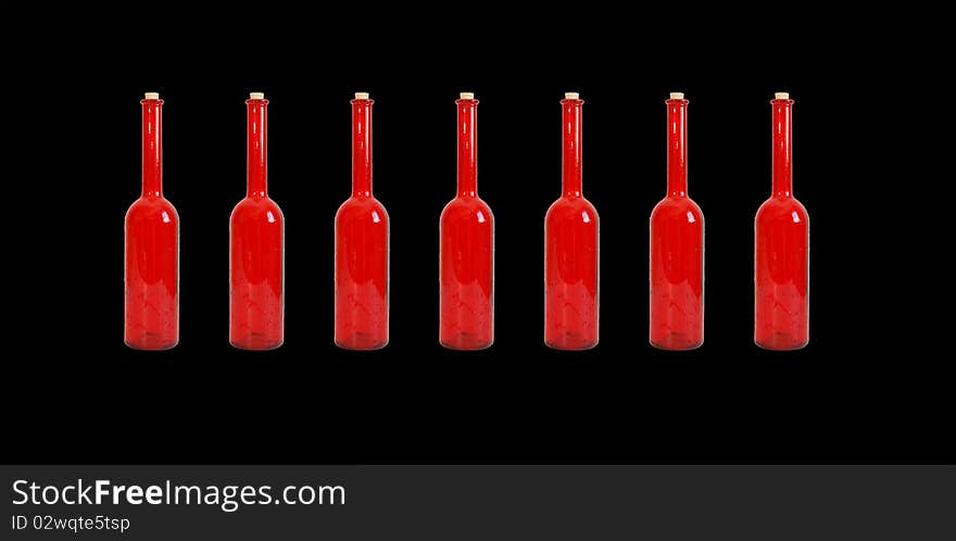 Colored glass vase on a black background