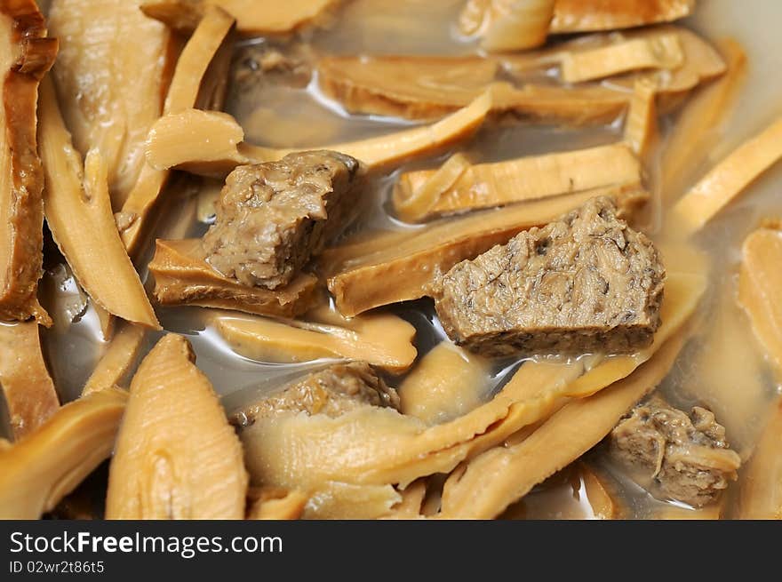 Traditional Oriental brew soup made from bamboo shoots and meat.