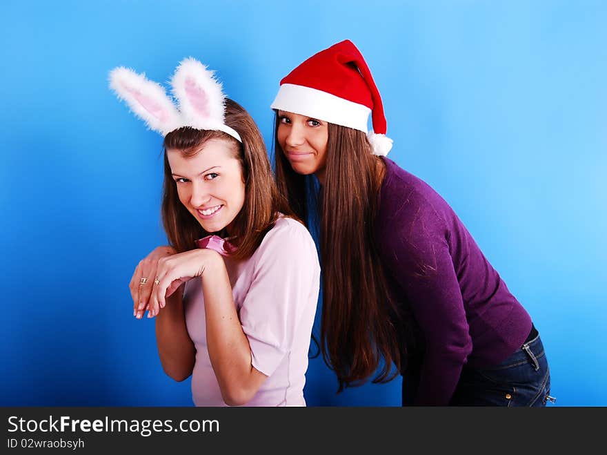 playgirl with bunny ears on a blue background. playgirl with bunny ears on a blue background.