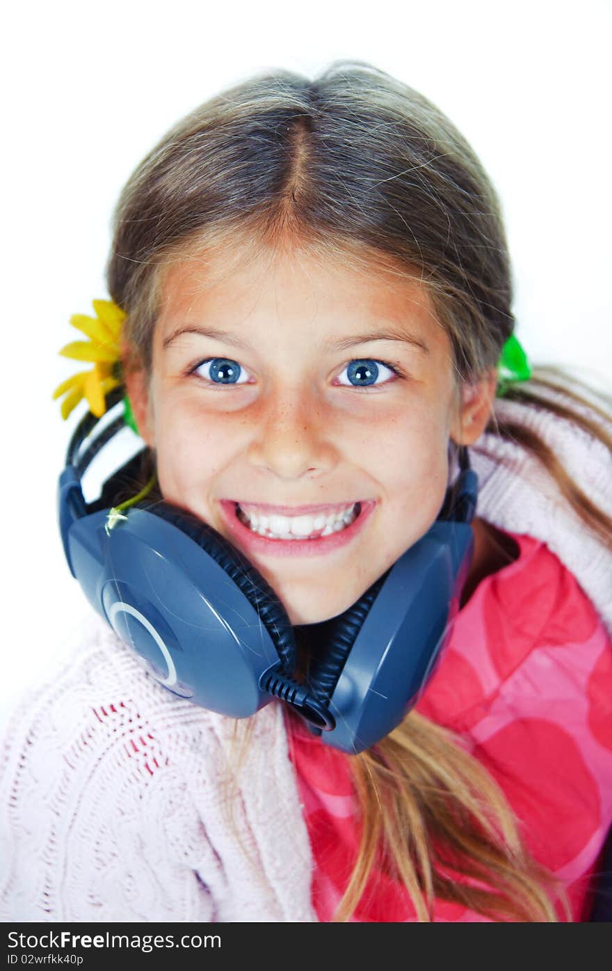 Portrait cute pretty girl with headphones. In the studio. Portrait cute pretty girl with headphones. In the studio