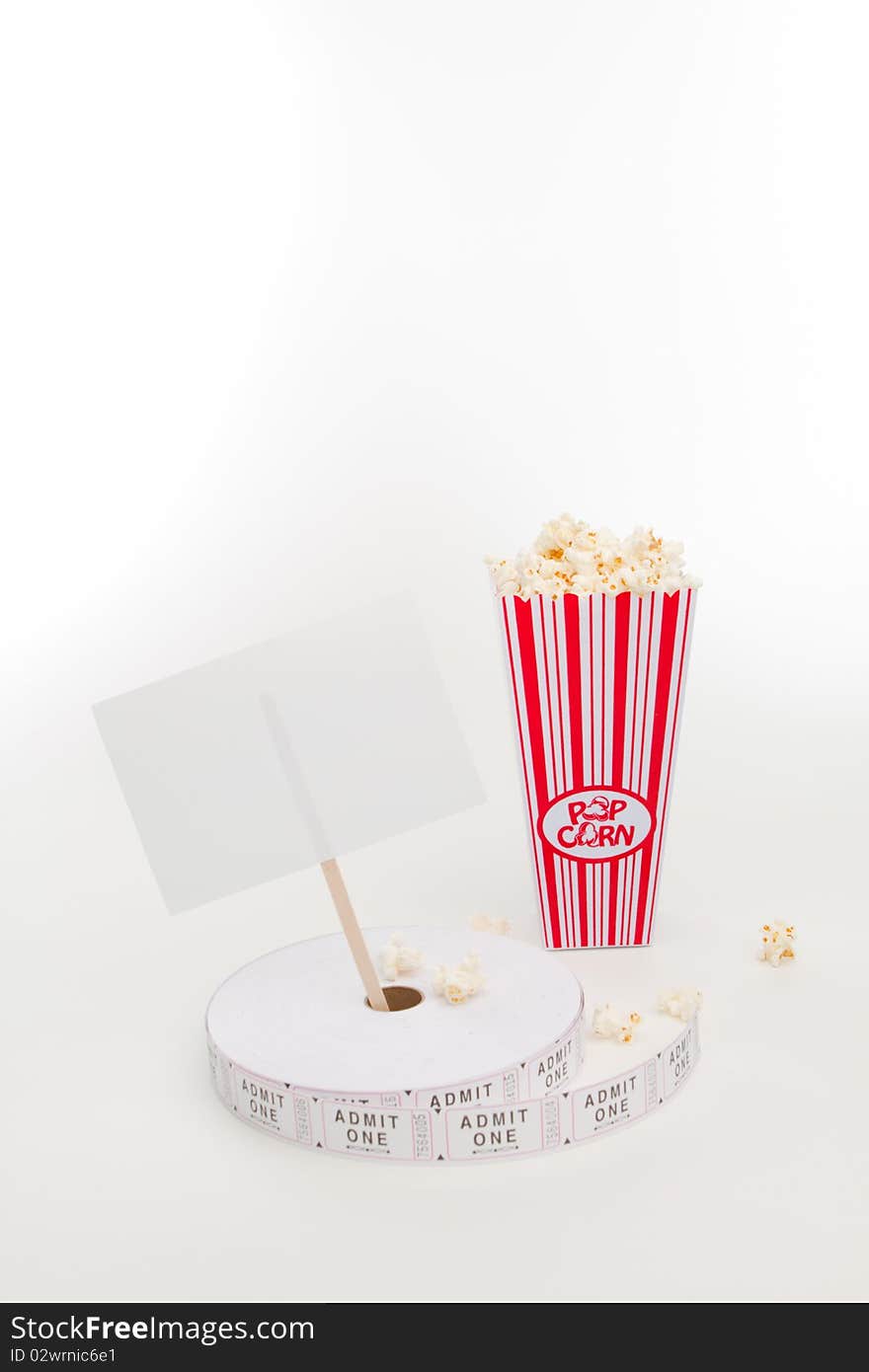 Popcorn, movie tickets and a sign