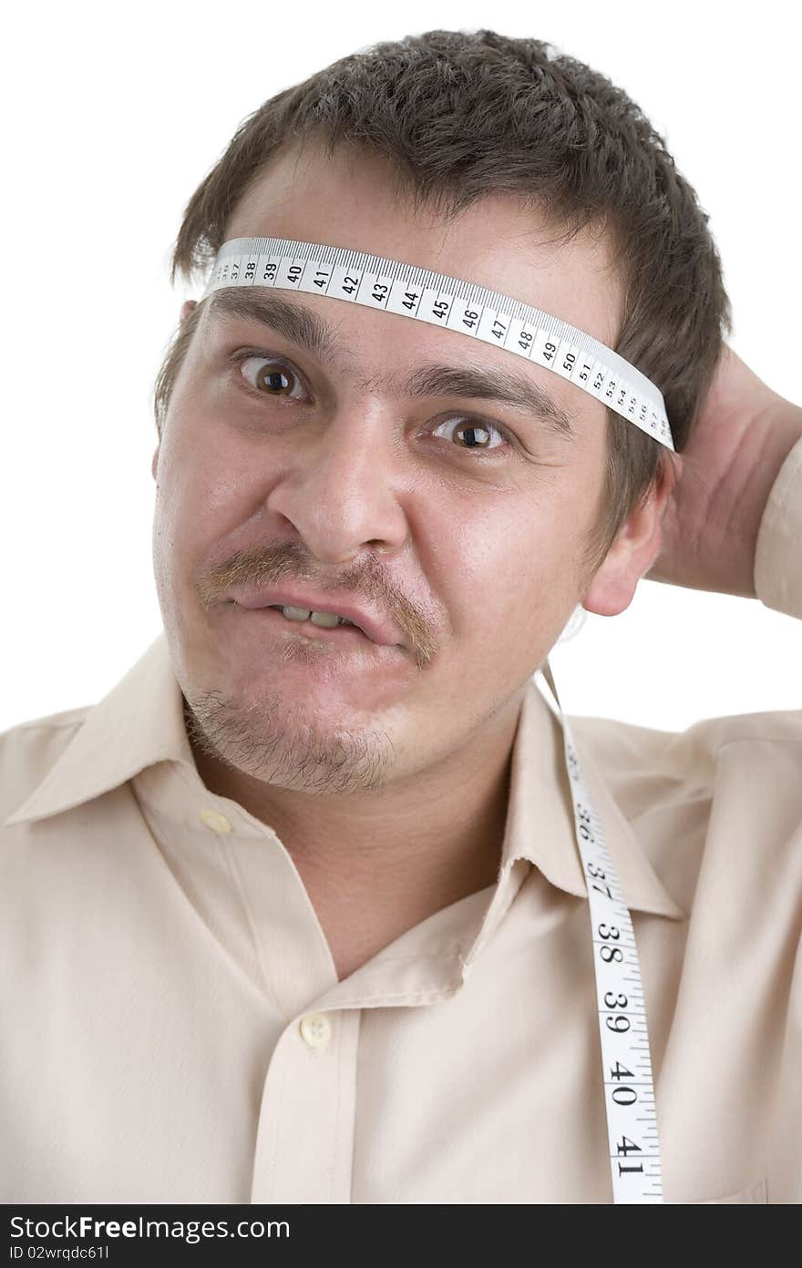 Man measuring his head, isolated on white