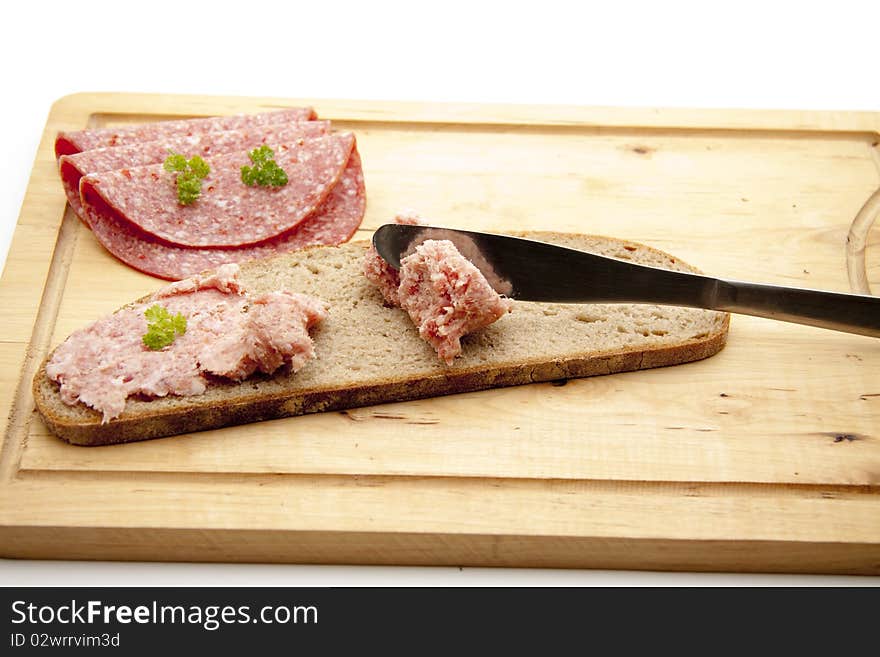 Coarse mead sausage on bread