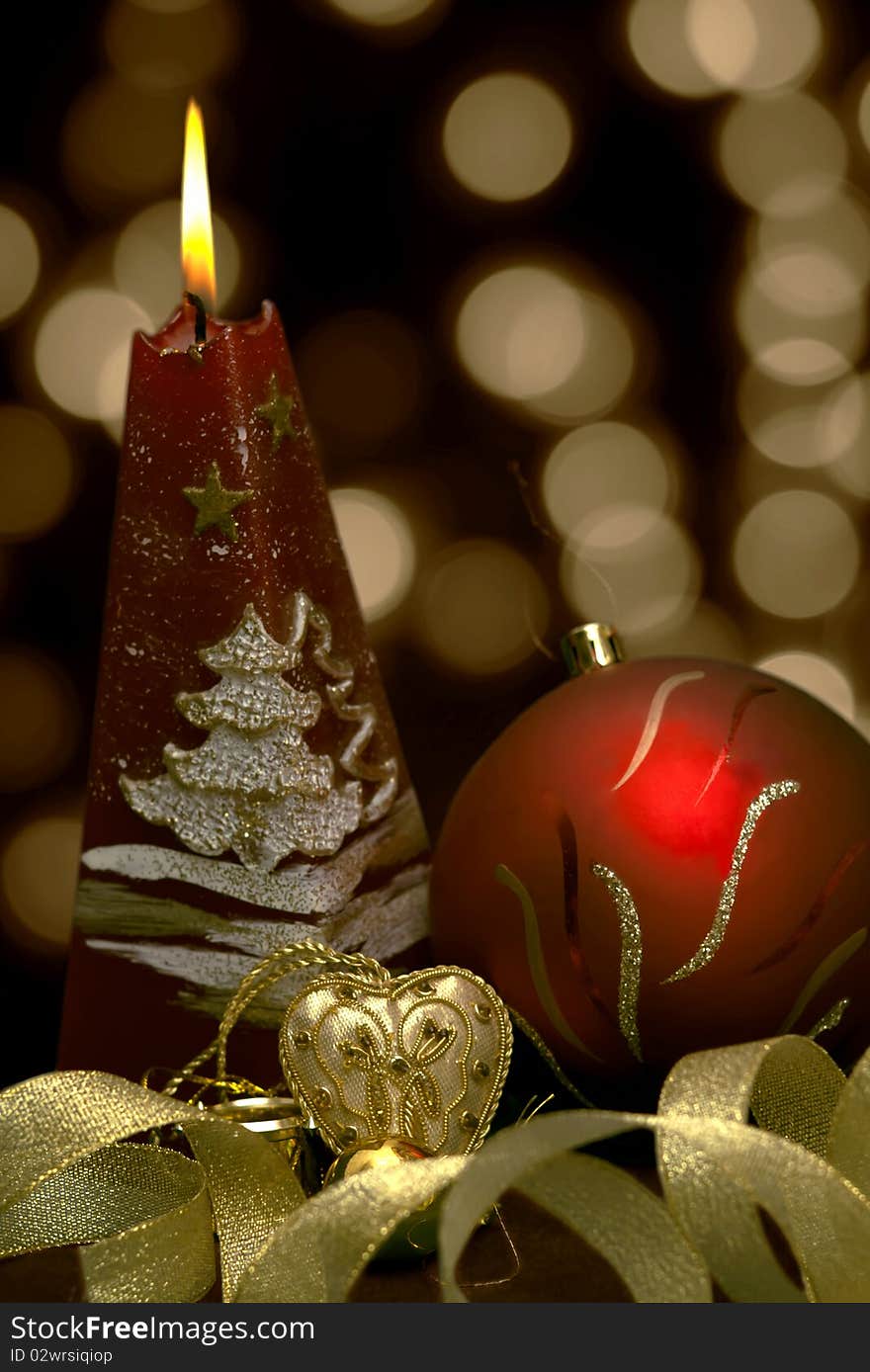 Christmas  still life - red burning candle with ev