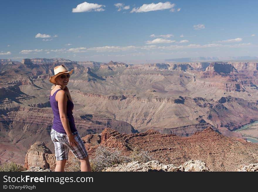 A woman enjoying the view of the canyons in USA