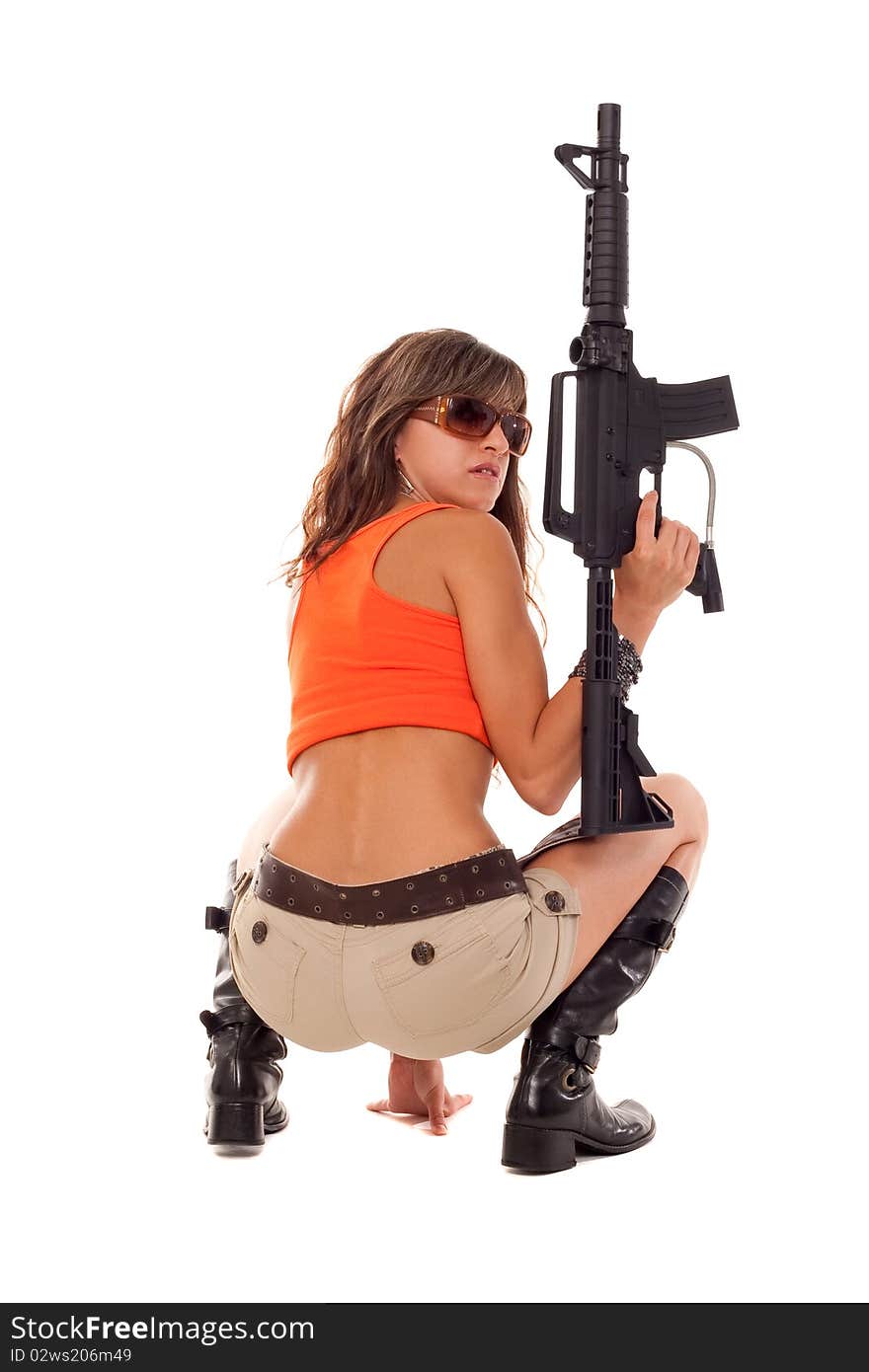 Image of a posing girl with a rifle. Image of a posing girl with a rifle