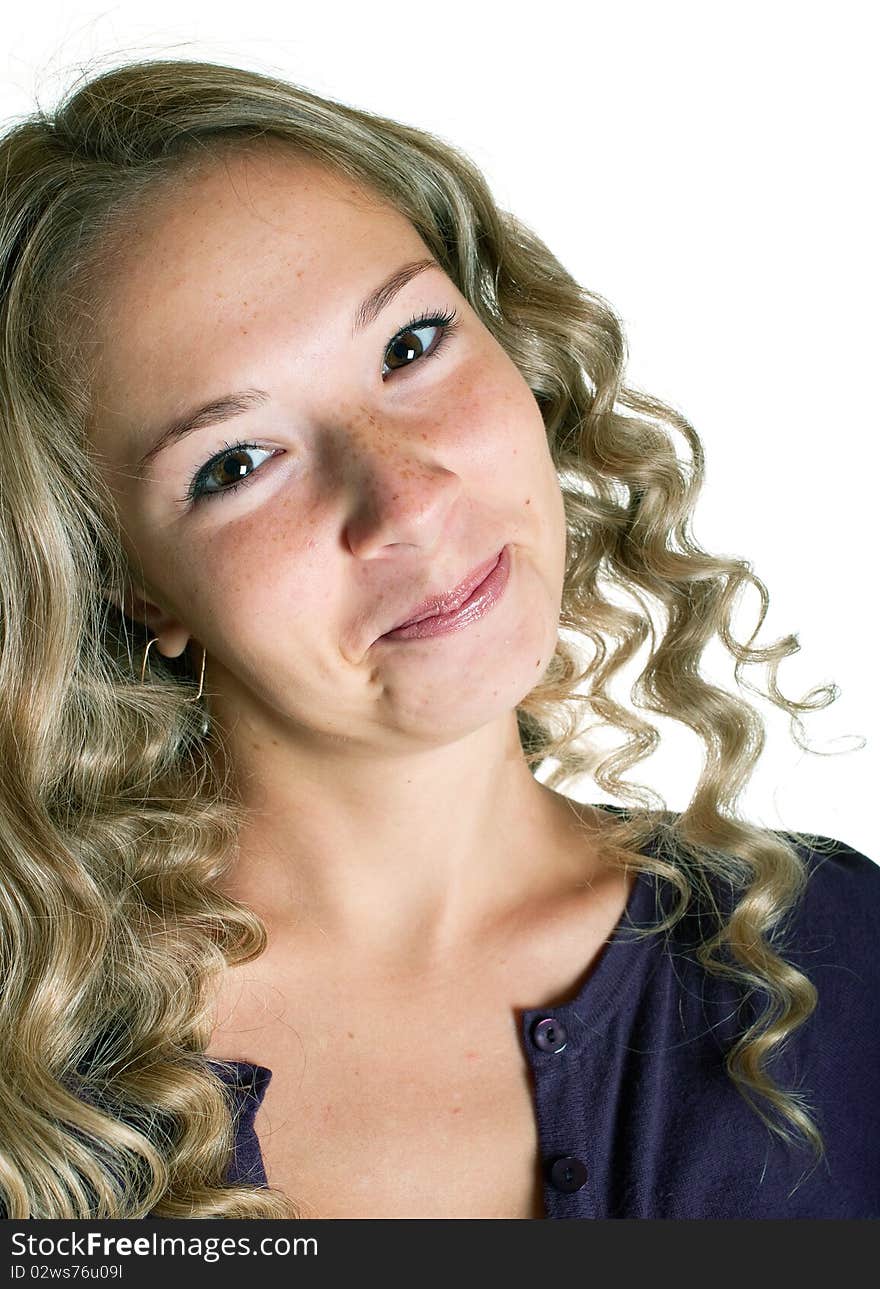 The young beautiful girl in a lilac shirt. Isolation on a white background