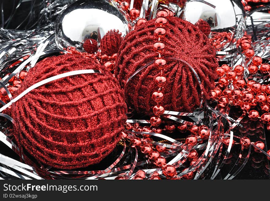 Red christmas balls over black