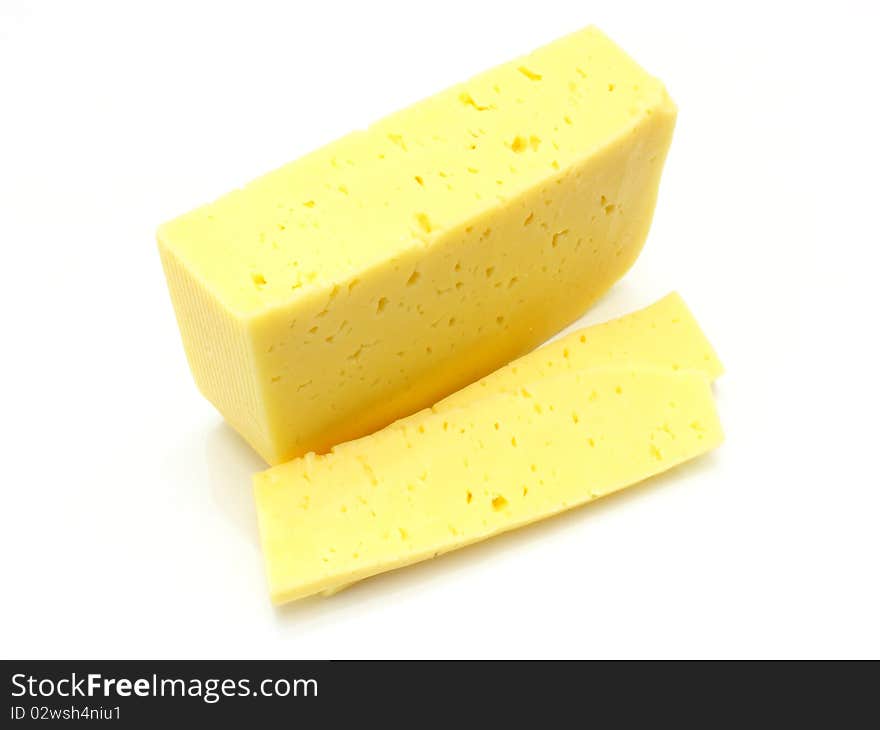 A piece of Swiss cheese isolated on white yellow delicatessen;