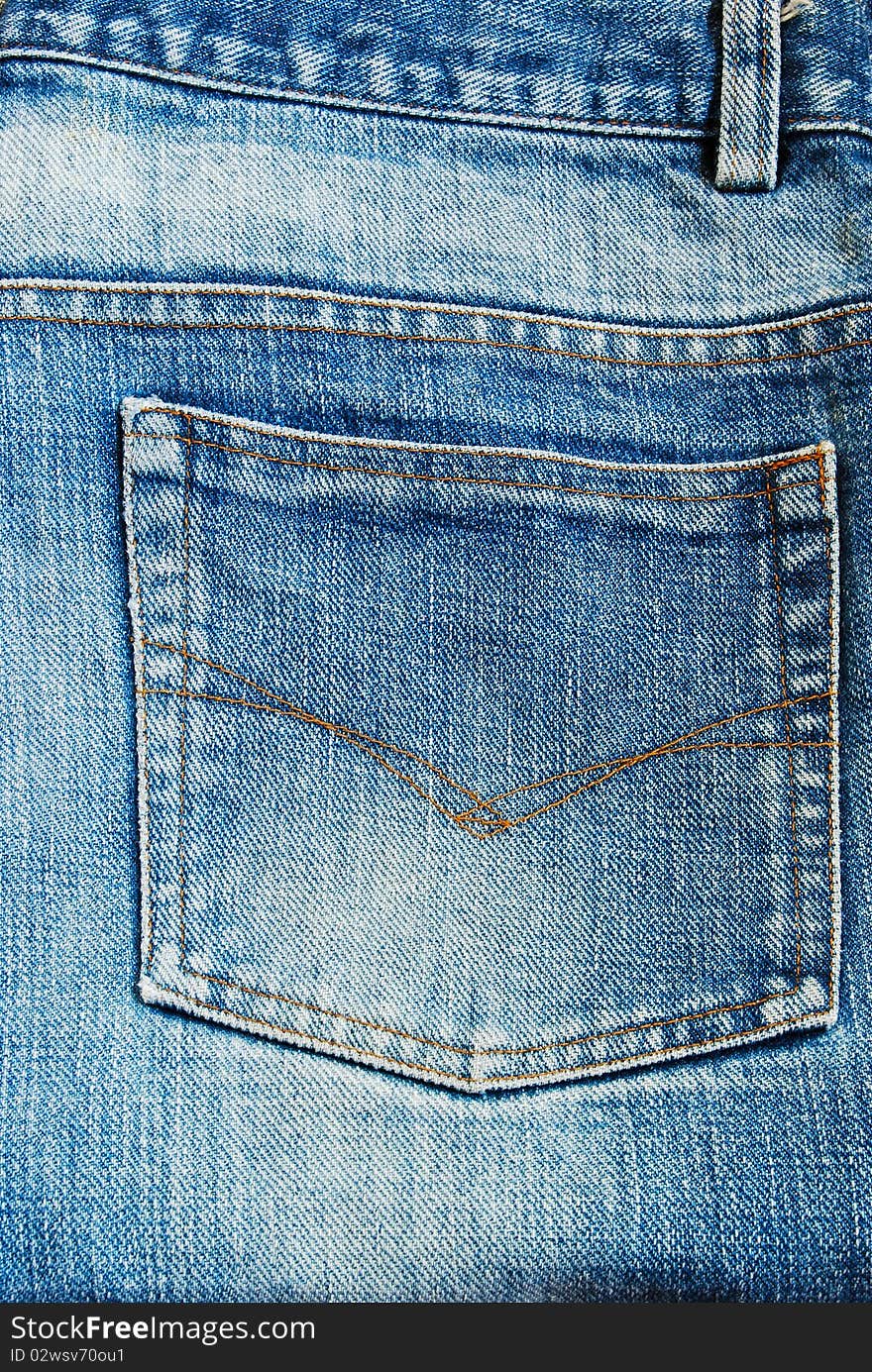 Blue jeans back pocket background texture