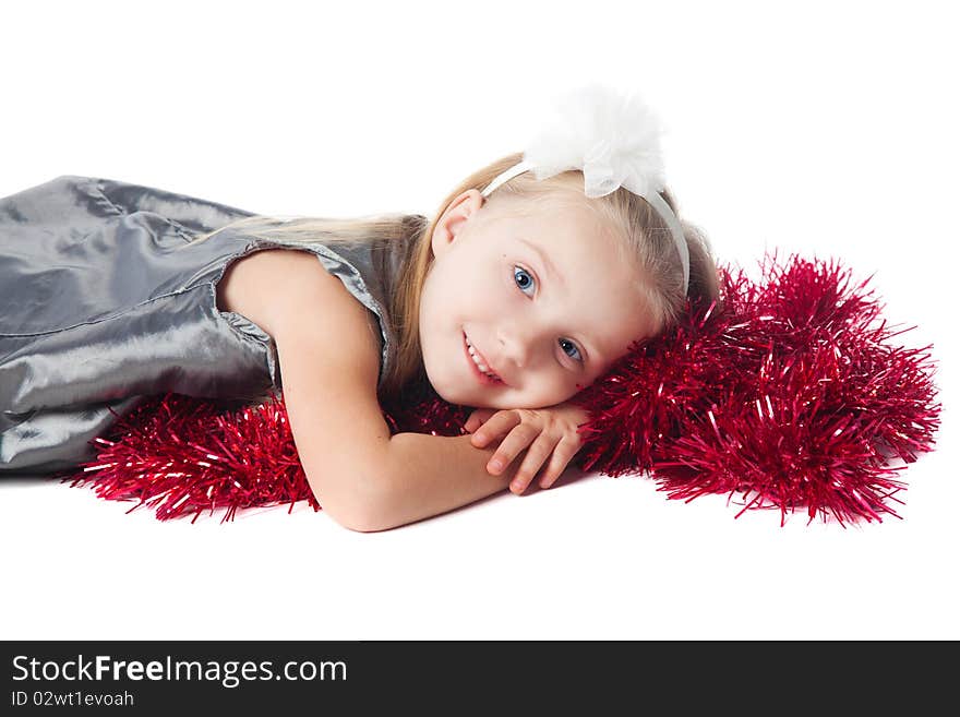 Smiling little girl with red decoration isolated. Smiling little girl with red decoration isolated