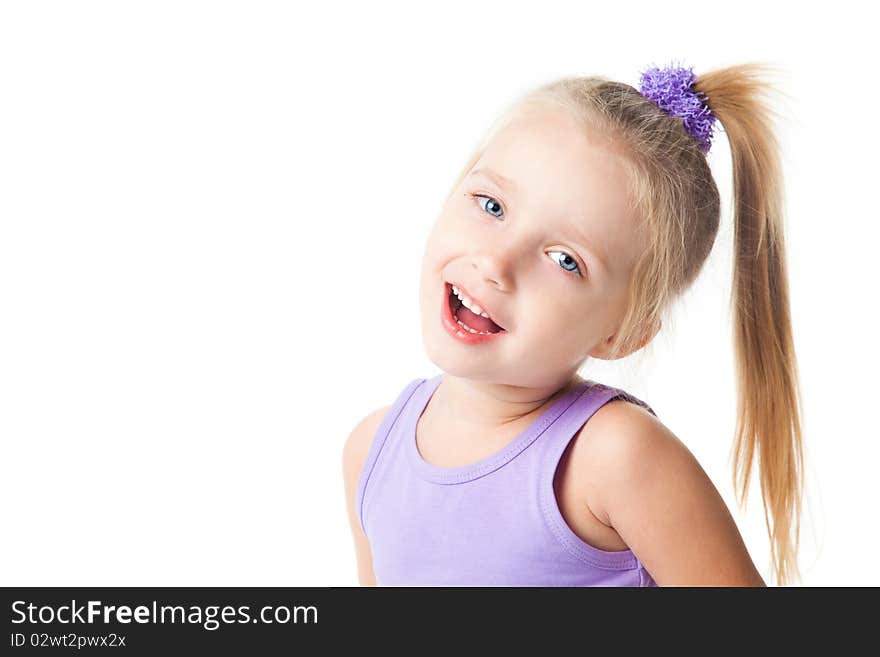 Smiling little girl in purple t-shirt isolated