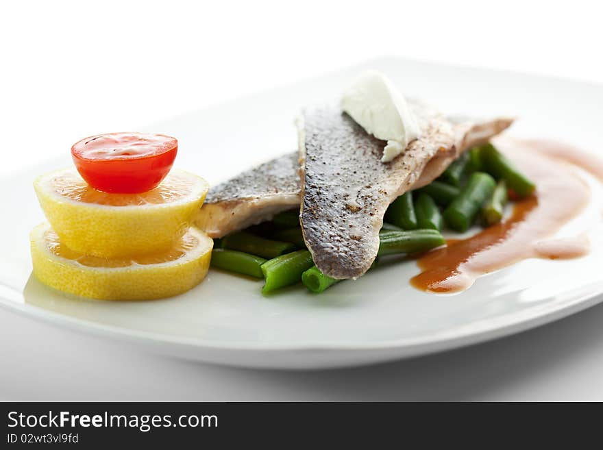 Steamed Fish with Sauce, Lemon and Cherry Tomato