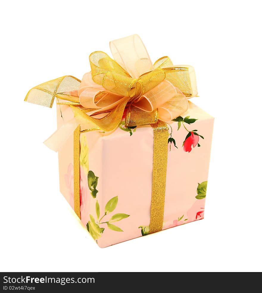 Pink gift  with a gold bow