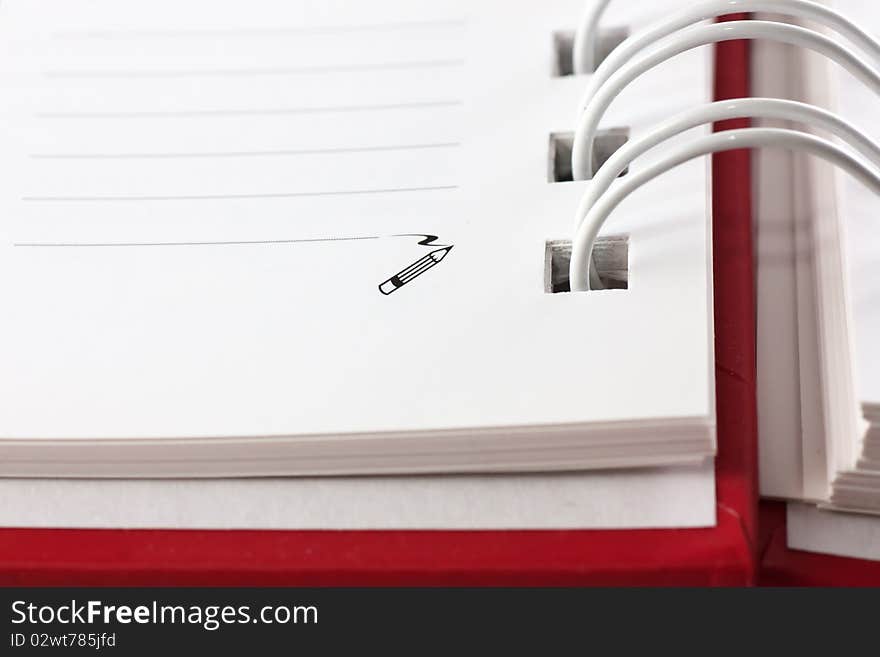 Macro view of blank spiral notebook.