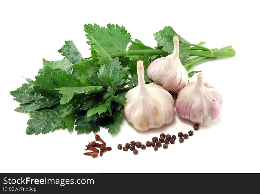 Garlic with leaves of a celery and spices