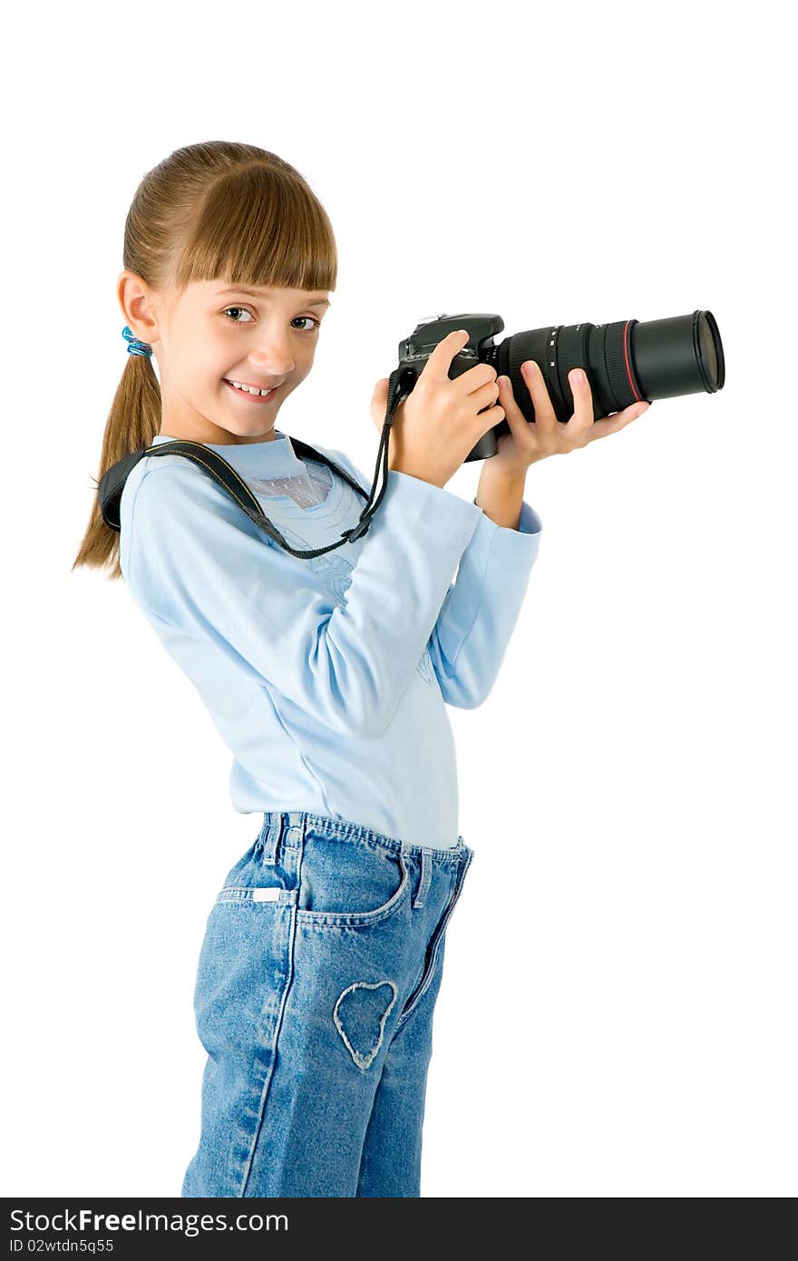 The girl - photographer is photographed on the white background