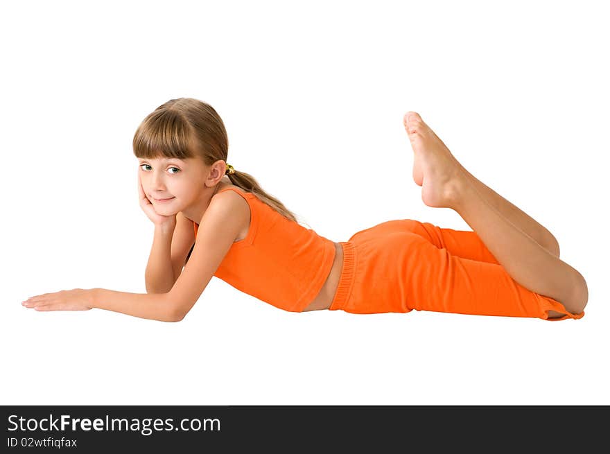 The girl in orange clothes is photographed on the white background