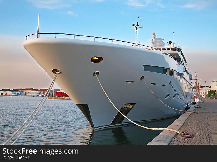 A large private motor yacht in the harbor