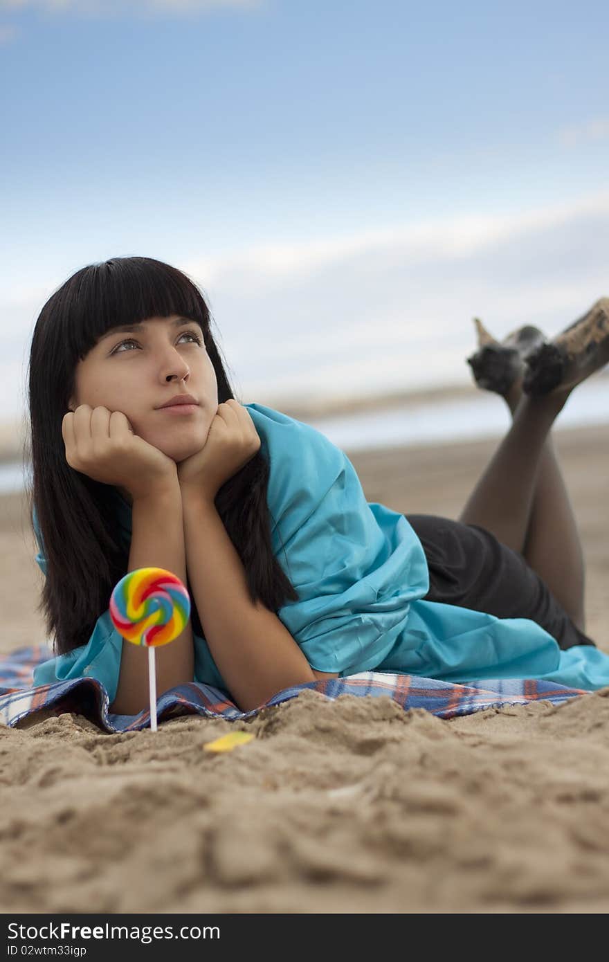 Woman Eating Candy Lollipops