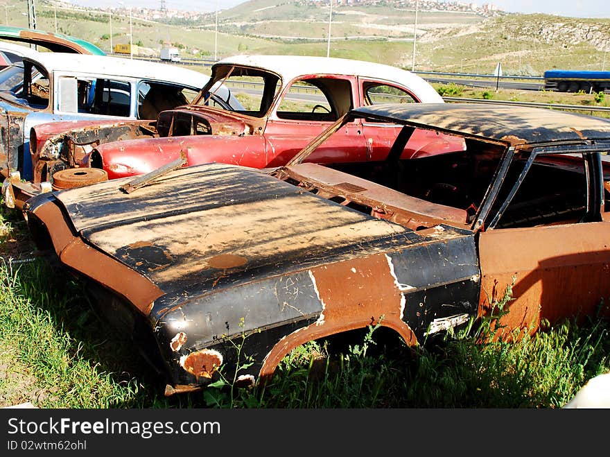 Vintage cars abandoned and rusting away in rural wyoming. Vintage cars abandoned and rusting away in rural wyoming