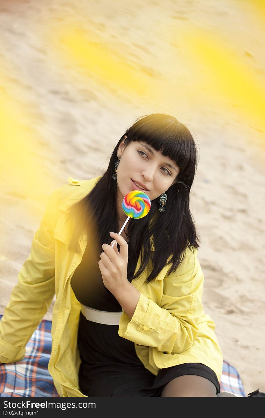 Woman Eating Candy Lollipops