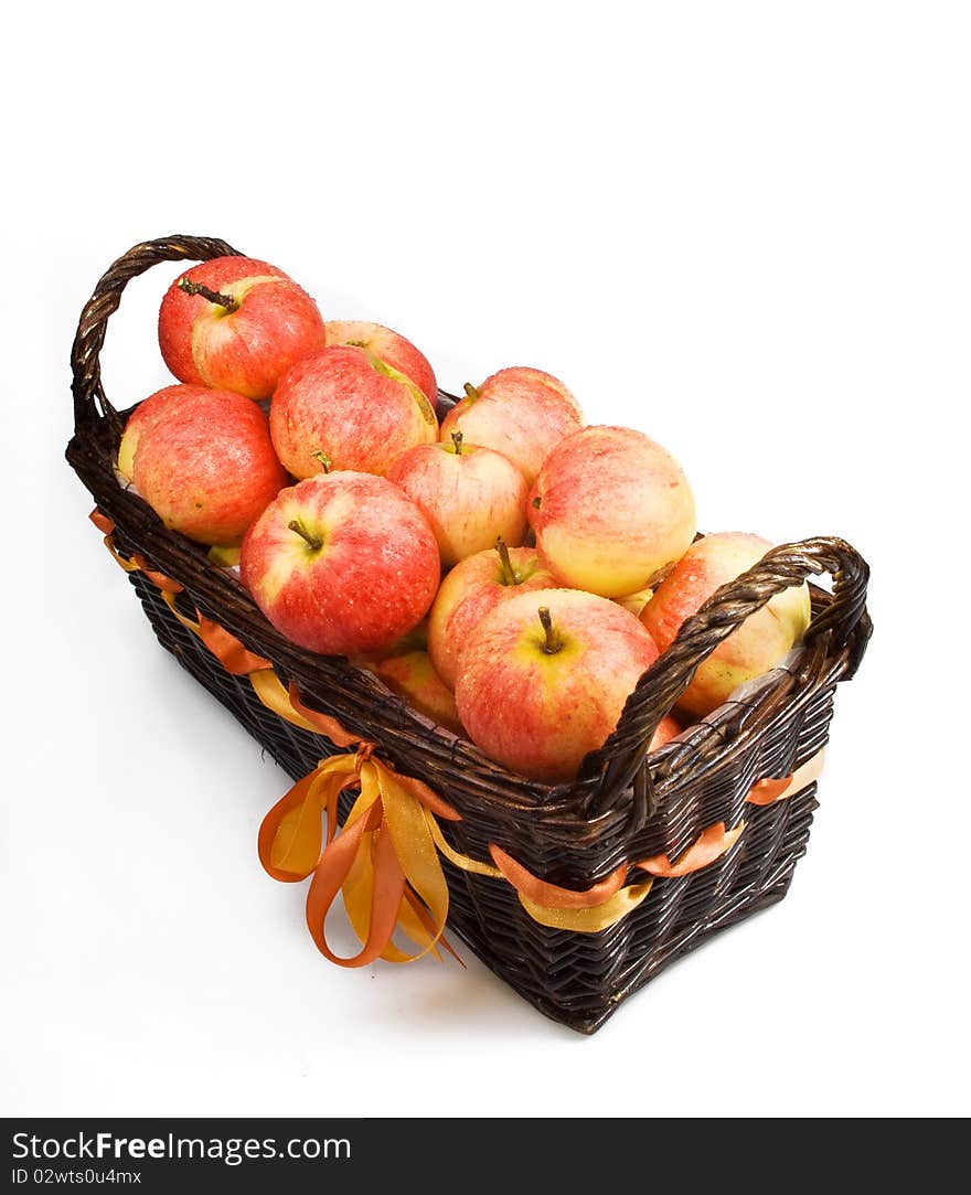 Basket with apples isolated on the white