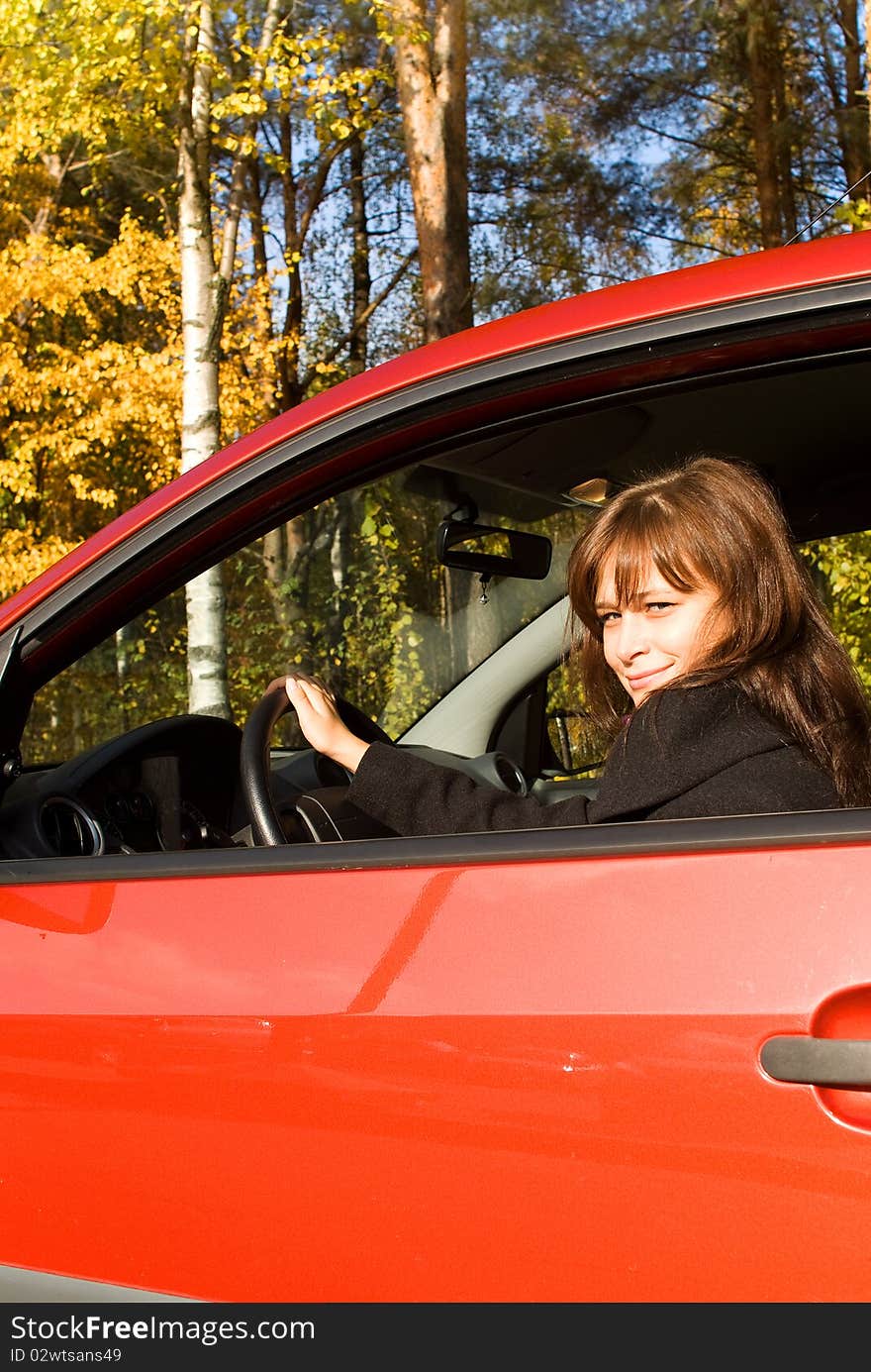 The girl in the red car