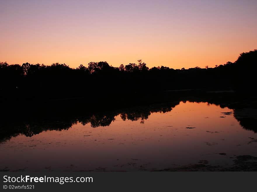 Beautiful dawn and evening colors at sunset over a lake