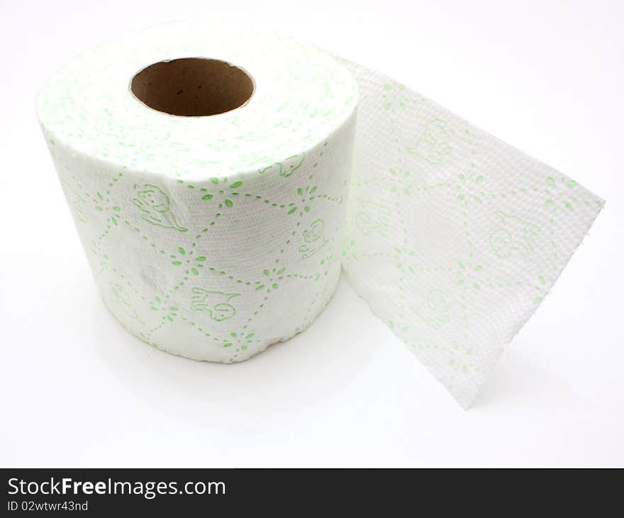 White roll of toilet paper isolated on white material;