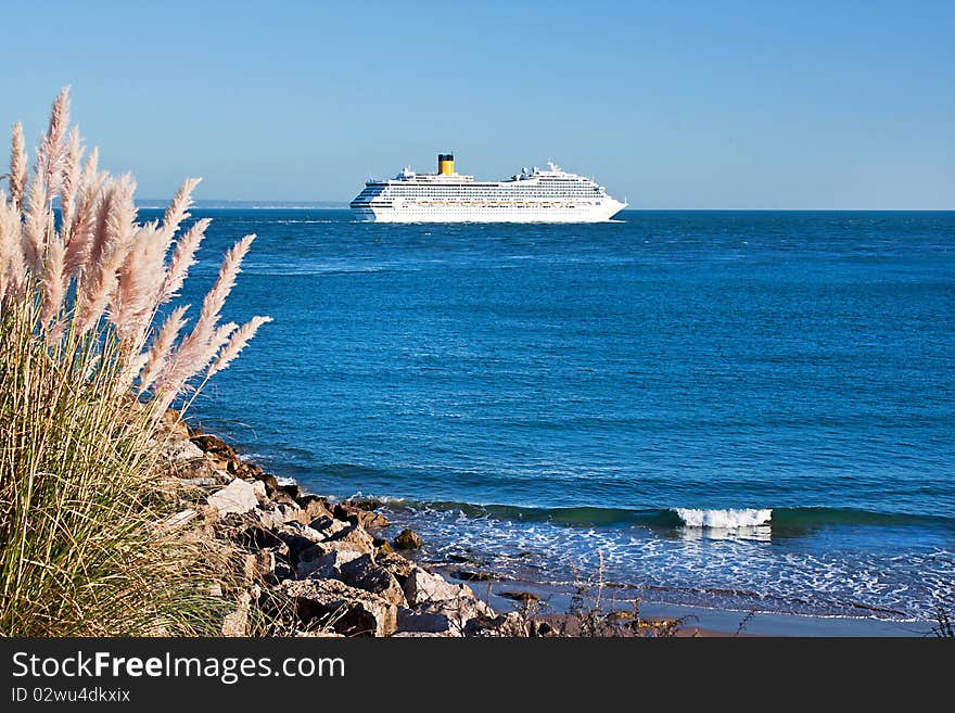 Cruise ship leaving the bar of the river Tagus