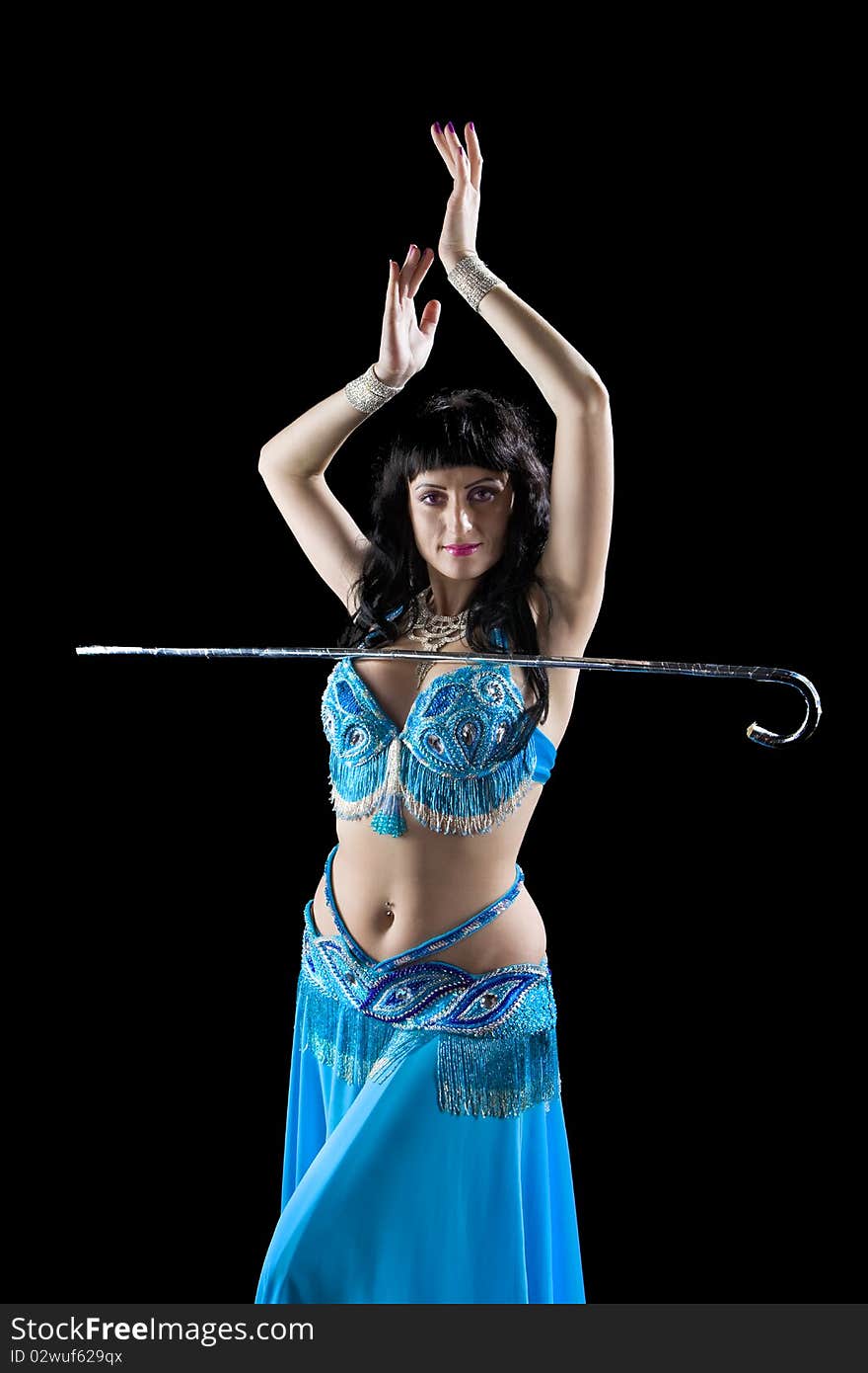 Woman in blue dance with cane