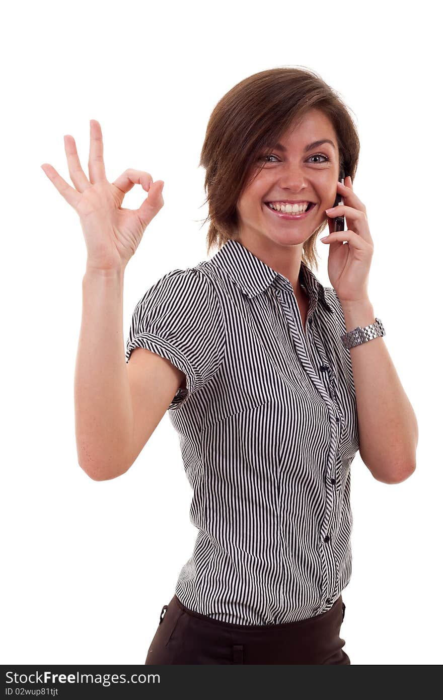 Woman with phone and ok gesture