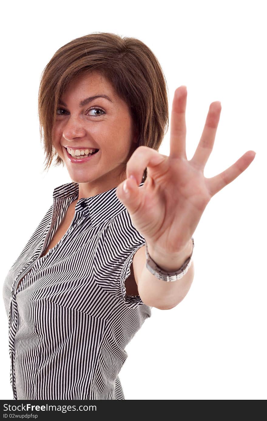 Young business woman indicating ok sign. Isolated over white background