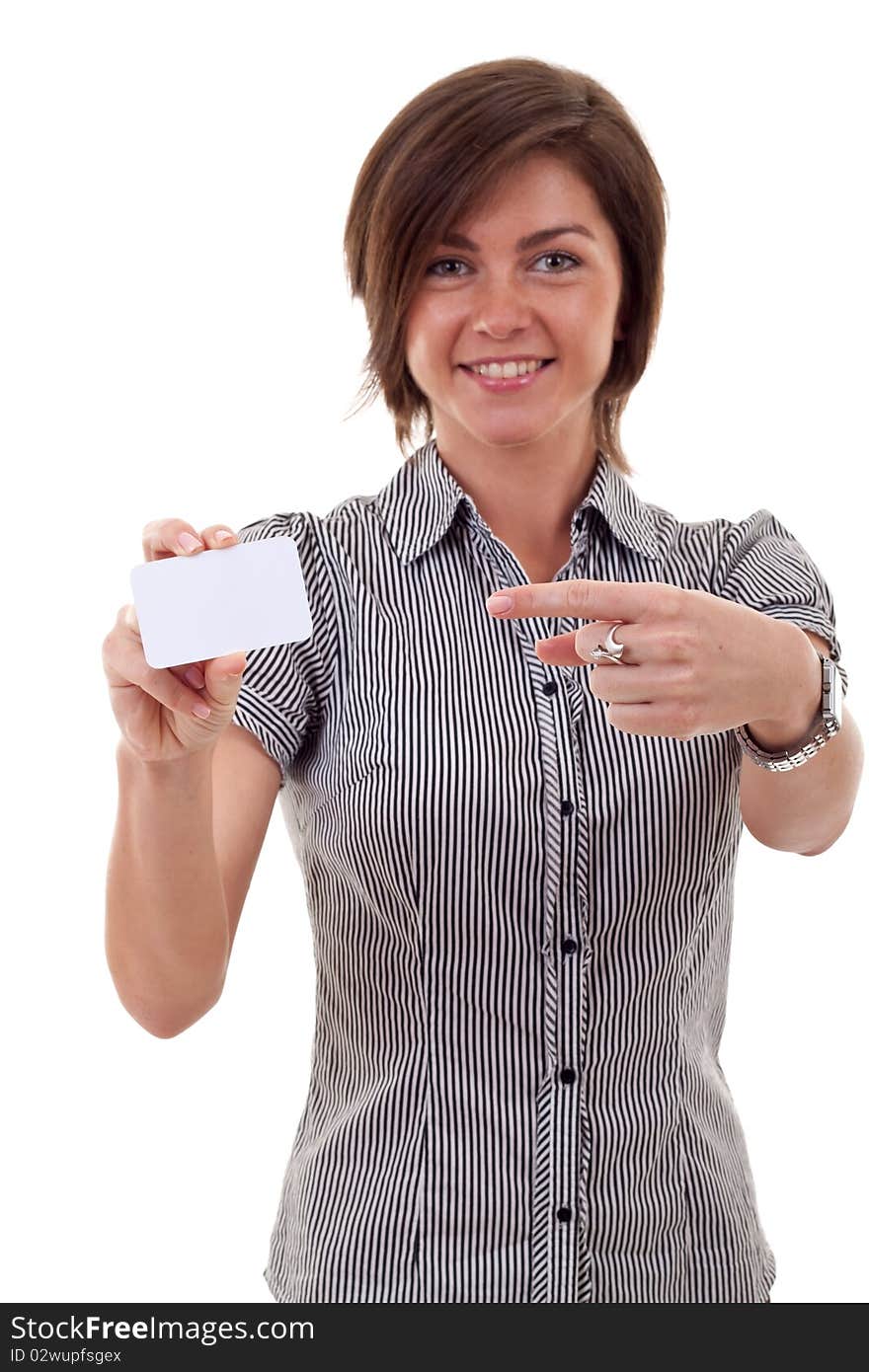 Image of pretty business woman holding a white business card pointing to it. Image of pretty business woman holding a white business card pointing to it