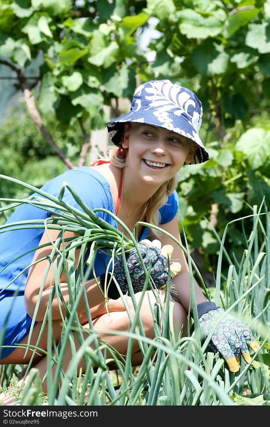 Woman Working In The Garden