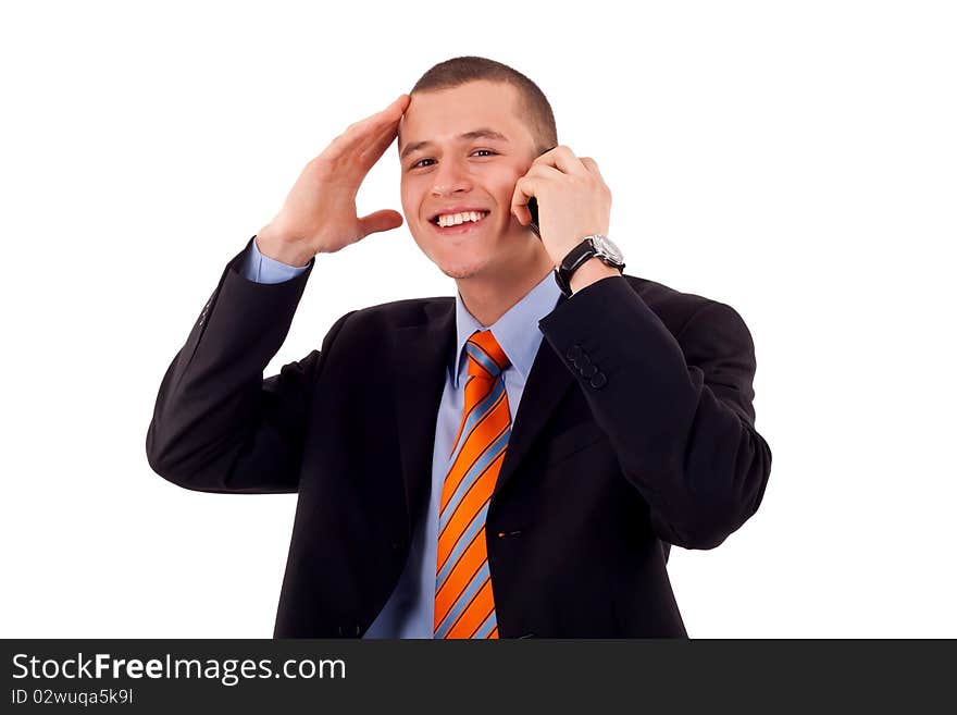 Business man talking on his mobile phone isolated on a white