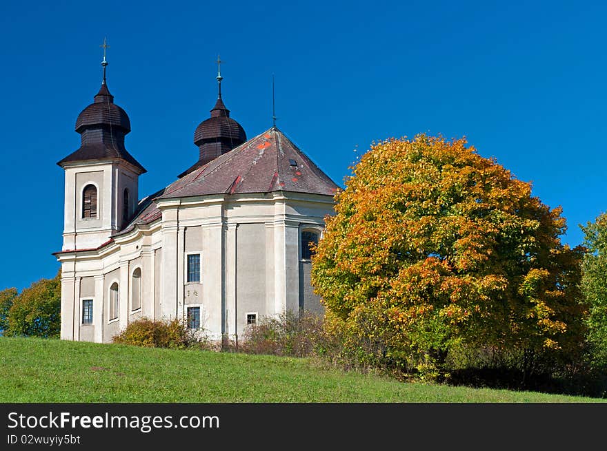 Baroque chapel during the autumn time, sunny day.