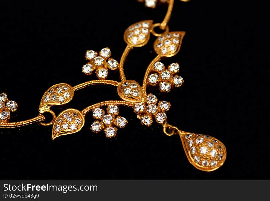 Close of Indian Jewelery on a black background. Close of Indian Jewelery on a black background..