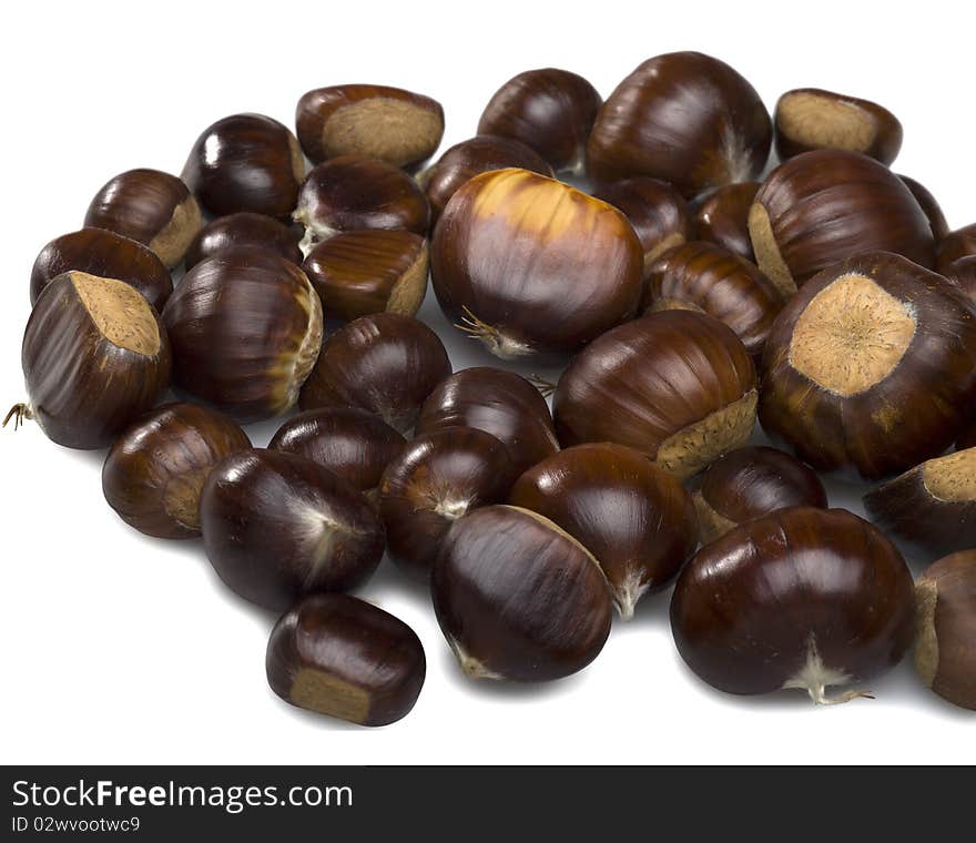 Chestnuts on white background.