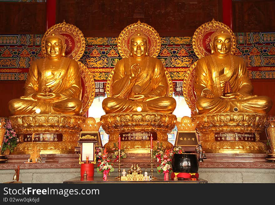 Three chinese style golden buddha. Three chinese style golden buddha