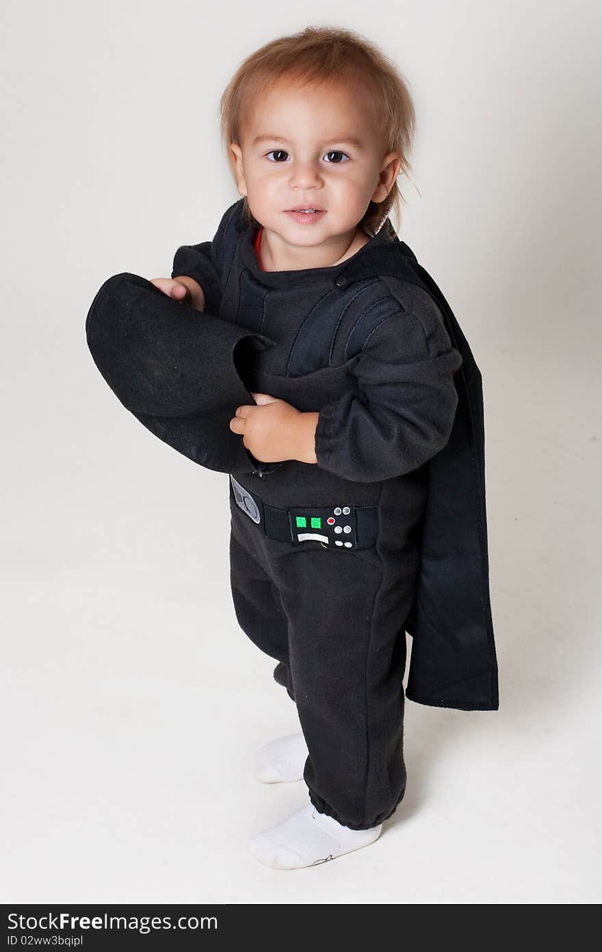 Little boy in a black suit