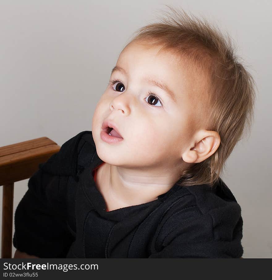 Portrait of a beautiful little boy with big eyes