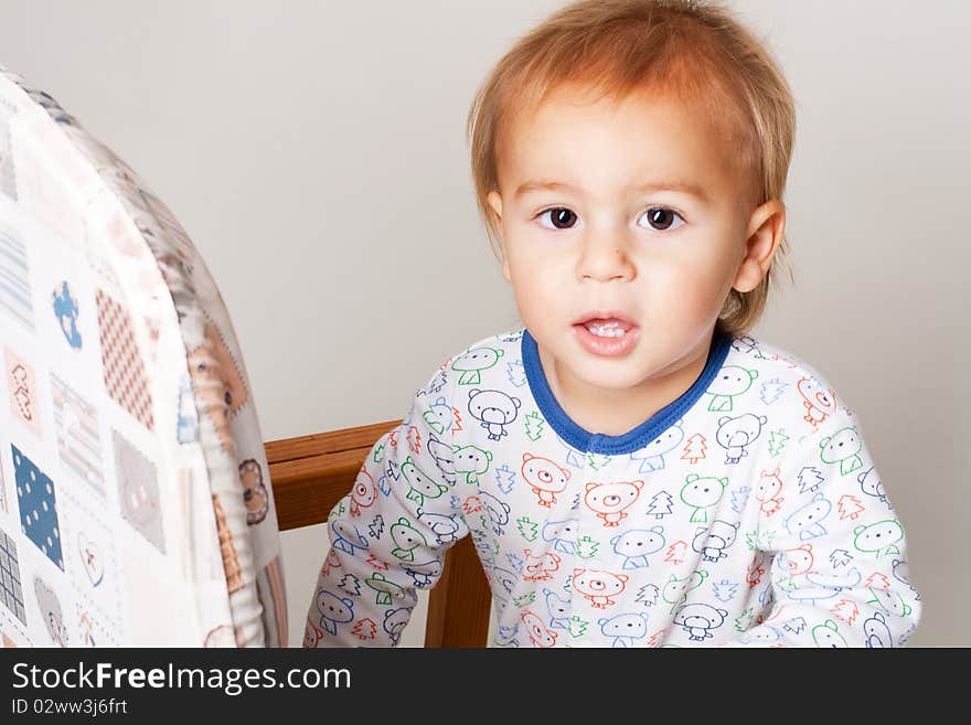 Portrait of a beautiful little boy with big eyes in a sleepwear. Portrait of a beautiful little boy with big eyes in a sleepwear