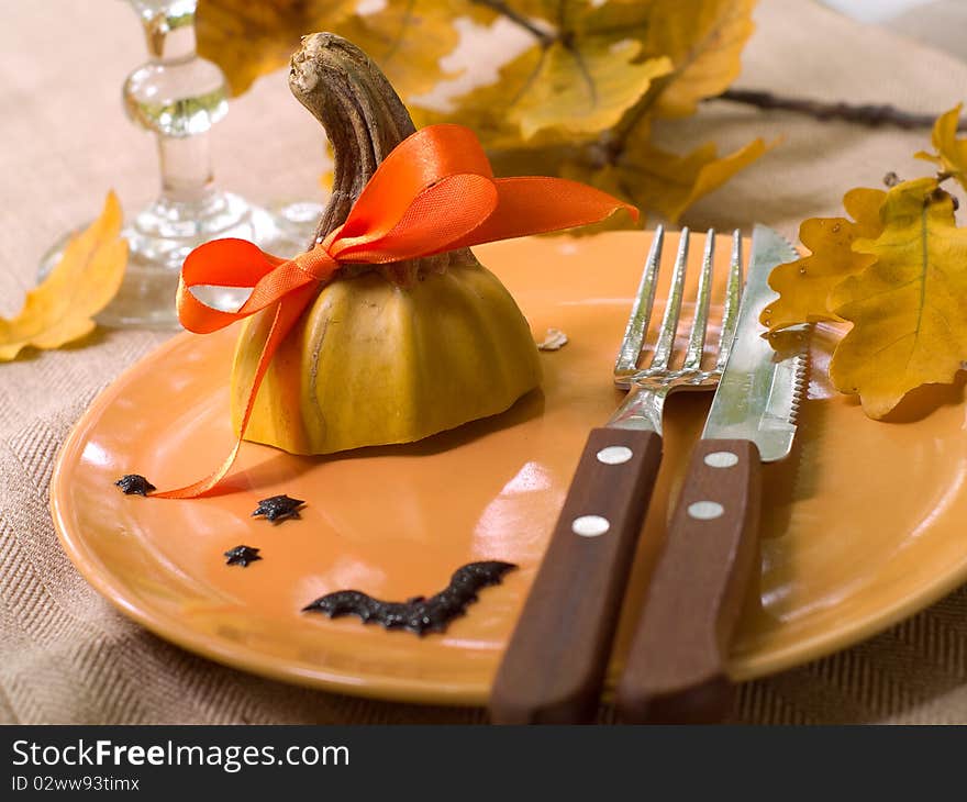 Knife and fork on empty plate,decoration for Halloween. Knife and fork on empty plate,decoration for Halloween