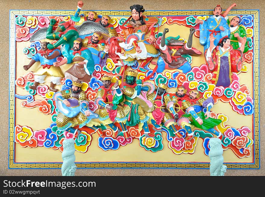 Colorful chinese style stucco on wall.