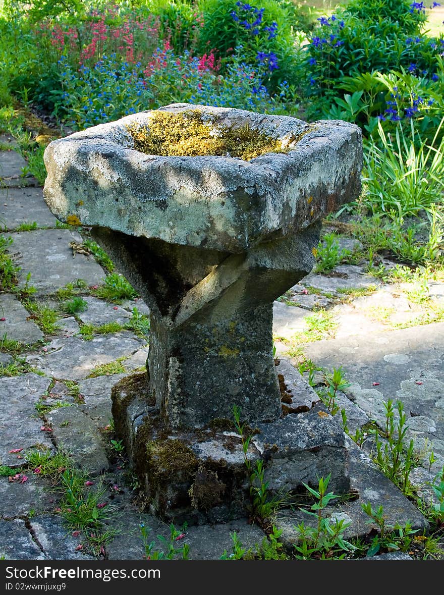 Old bird bath in a local park. Old bird bath in a local park