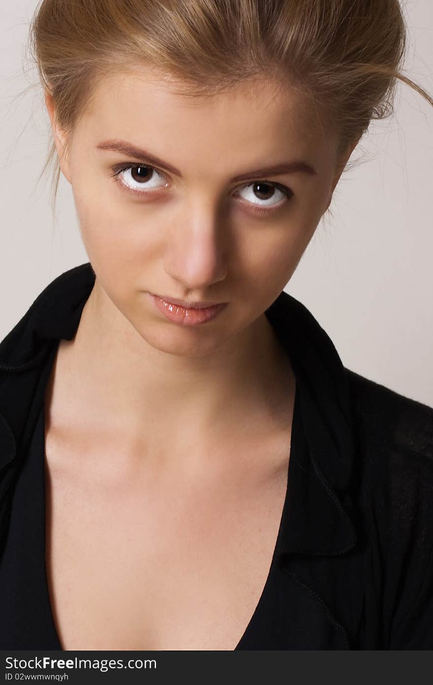 Portrait of a beautiful young woman with brown eyes